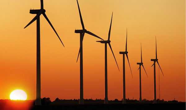wind turbines silhouette in sunset